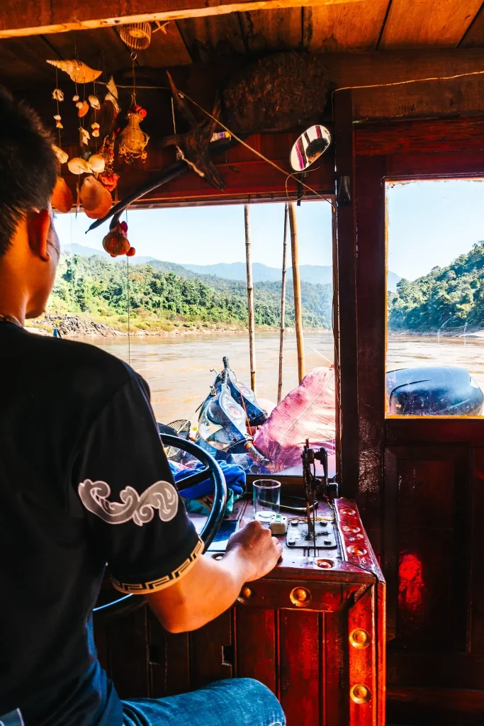 Transportation in Laos 4 Captain in the Slow Boat