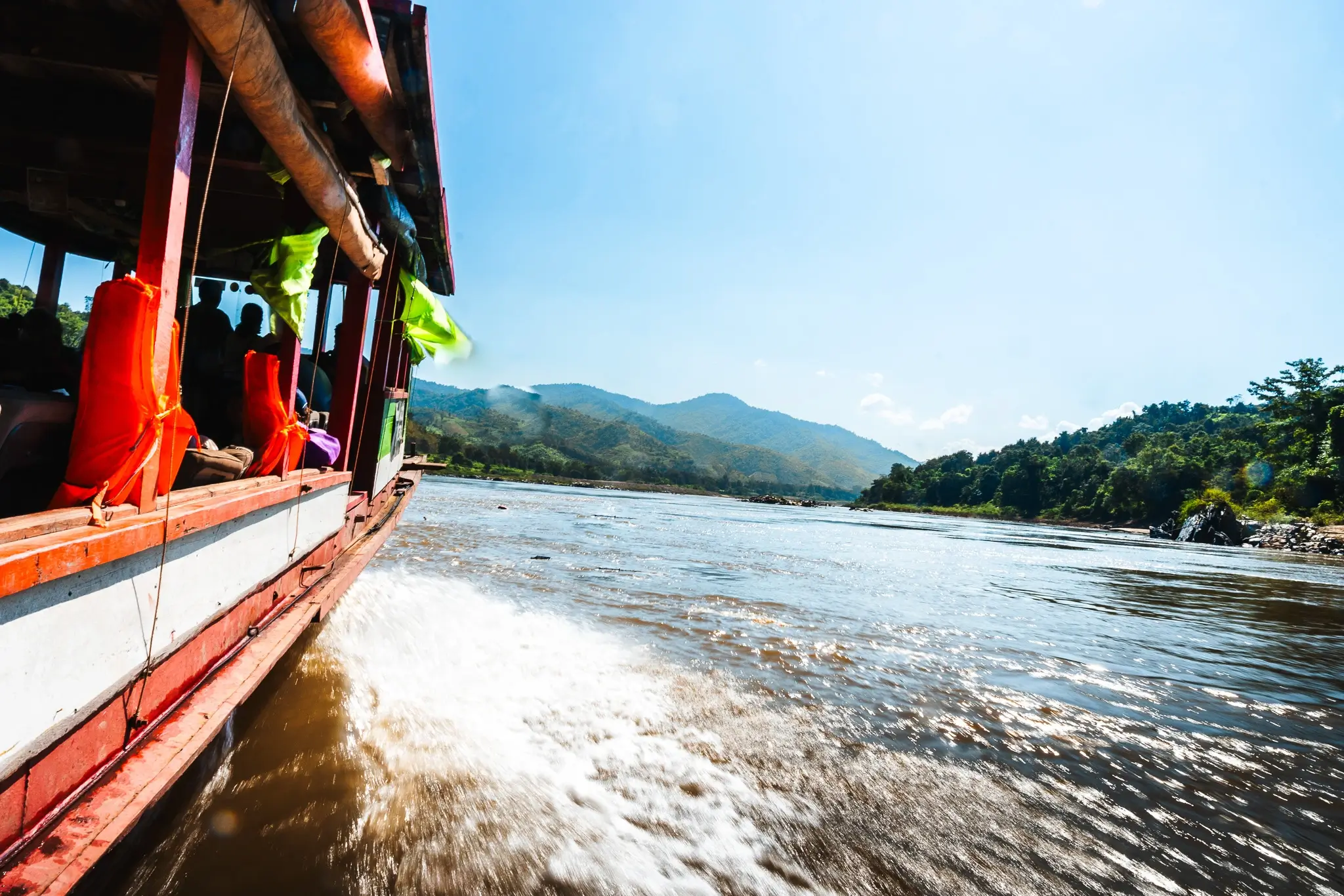 Slow Boat sailing on the mekong