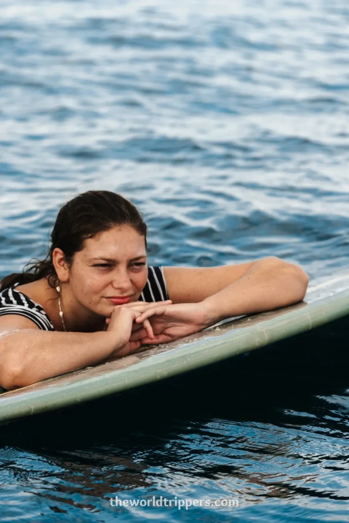 Discover Sipora: relaxing and surfing on the Mentawai Islands in West Sumatra 1 Chilling on a surfboard